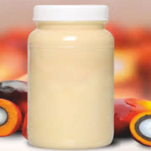 Pale semi-solid palm fatty acid distillate in a sample jar